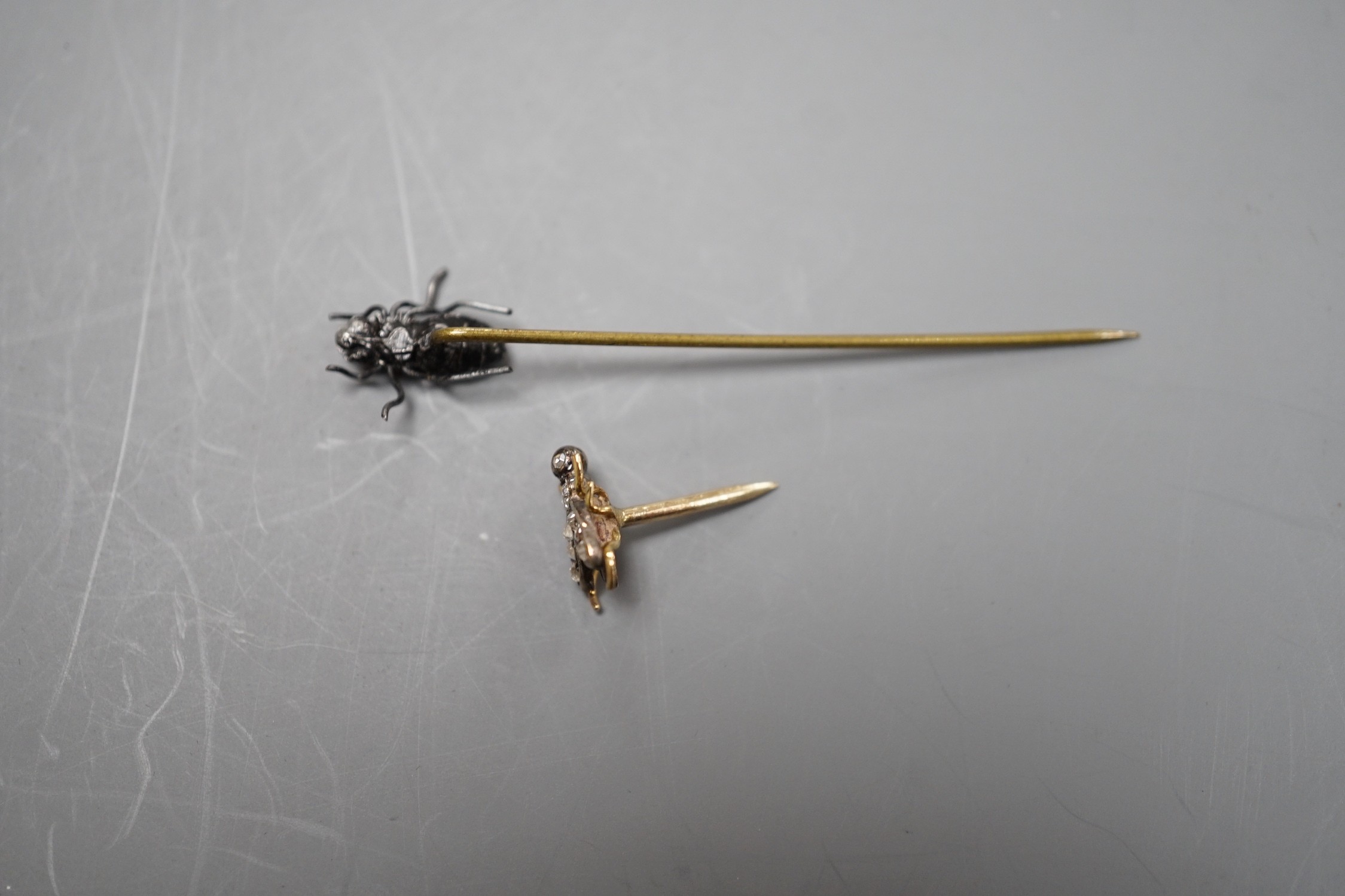 A 19th century yellow metal and rose cut diamond set 'fly' stud, 8mm and a bug stick pin.